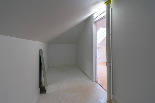 bonus room featuring vaulted ceiling