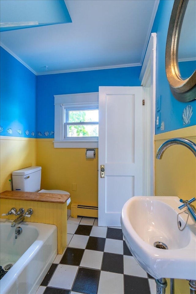 bathroom featuring sink, ornamental molding, a bath, a baseboard radiator, and toilet