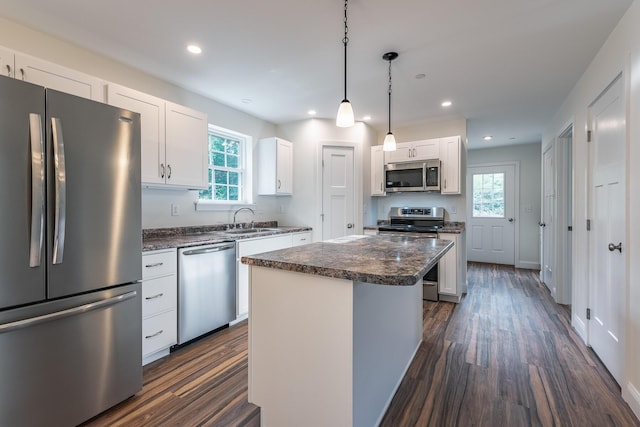 LOT5 Clarks Bridge Rd, Waterboro, ME 04087 - kitchen with appliances with stainless steel finishes, dark wood-style flooring, a kitchen island, white cabinetry, and recessed lighting