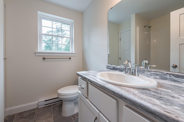 bathroom featuring vanity, a baseboard heating unit, tile patterned floors, toilet, and a tile shower