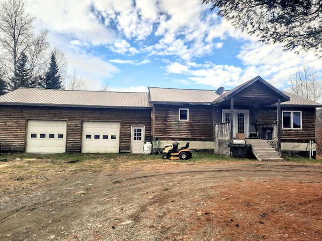 single story home featuring a garage