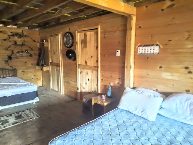 bedroom with wooden walls