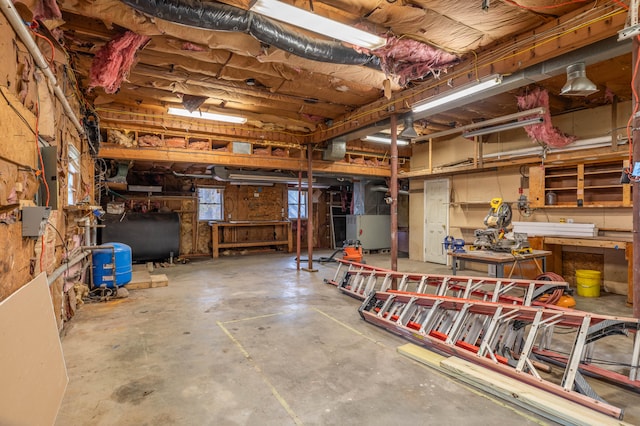 basement with a workshop area