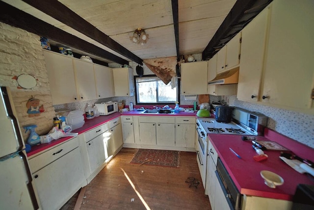 kitchen with white cabinets, white appliances, beamed ceiling, and dark hardwood / wood-style flooring