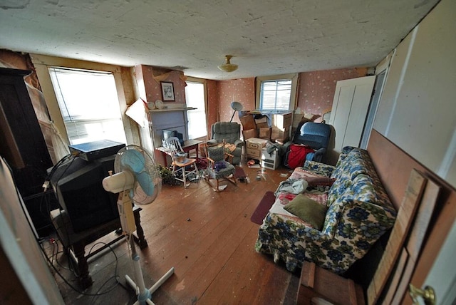 misc room featuring a fireplace and wood-type flooring