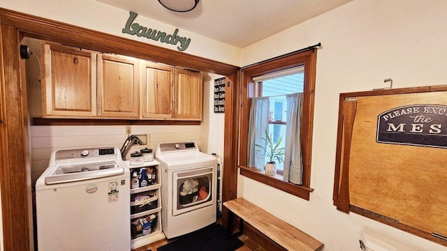 laundry area with cabinets and washer and dryer