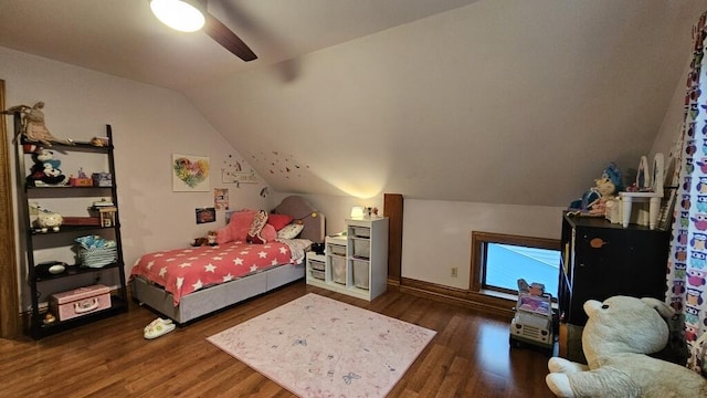 bedroom featuring lofted ceiling, dark hardwood / wood-style floors, and ceiling fan