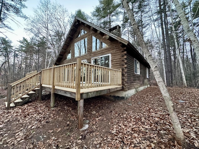 111 Ice Rd, Acton, ME 04001 - view of side of home featuring a wooden deck