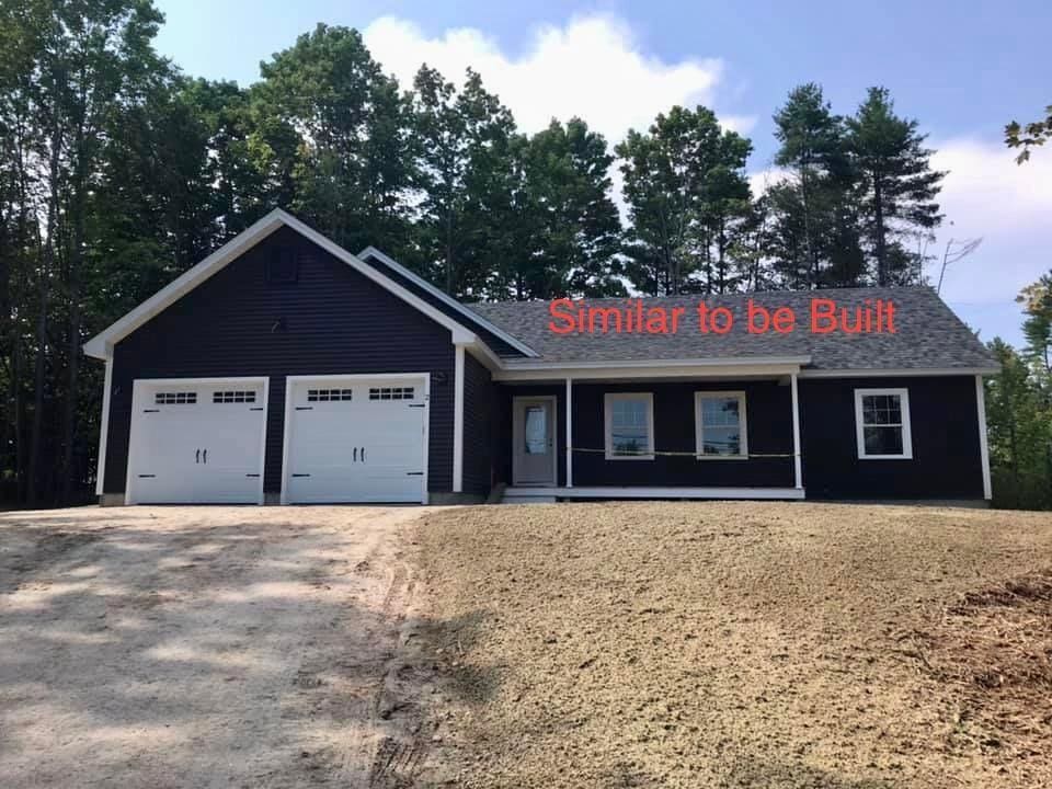 ranch-style home with a garage