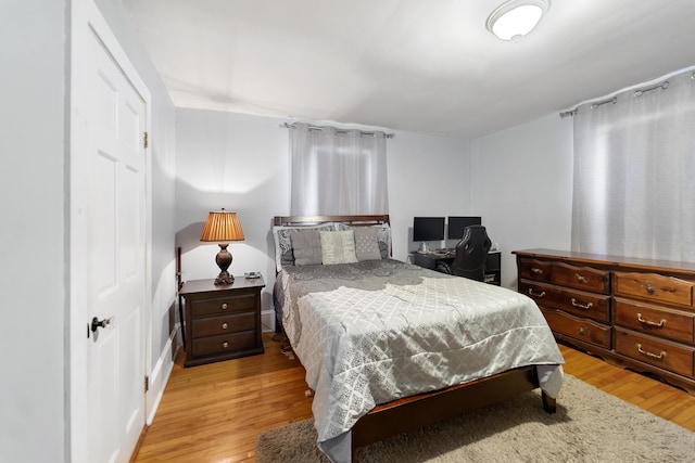 bedroom featuring light wood-type flooring