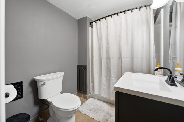 full bath with tile patterned flooring, toilet, vanity, and a shower with curtain