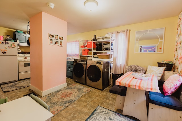 washroom featuring washer and dryer