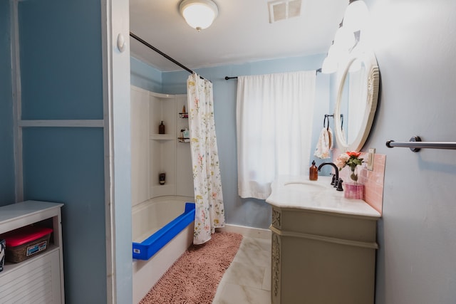 bathroom with vanity and shower / tub combo