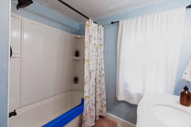 bathroom featuring shower / bath combination with curtain