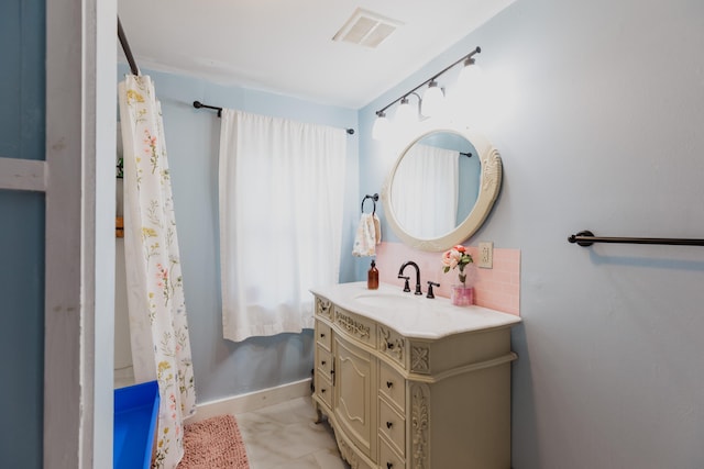 bathroom featuring vanity