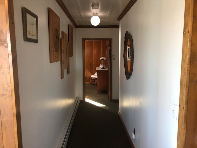 hallway with carpet, ornamental molding, and a baseboard radiator