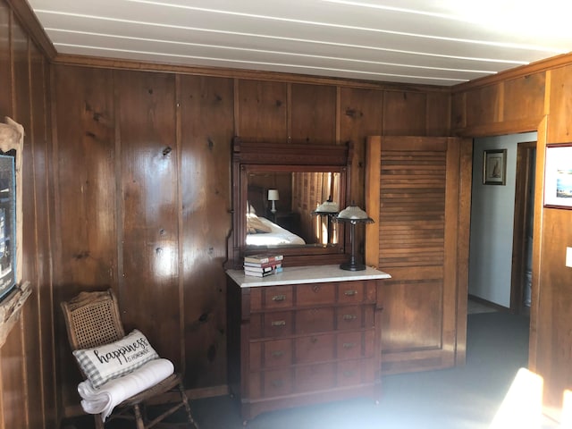 kitchen featuring wood walls