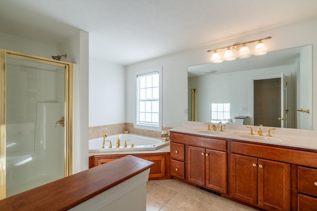 bathroom featuring tile patterned floors, vanity, and plus walk in shower