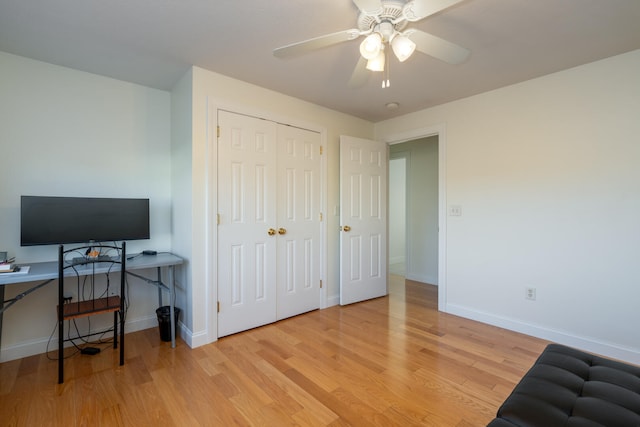 bedroom featuring ceiling fan and light wood-type flooring