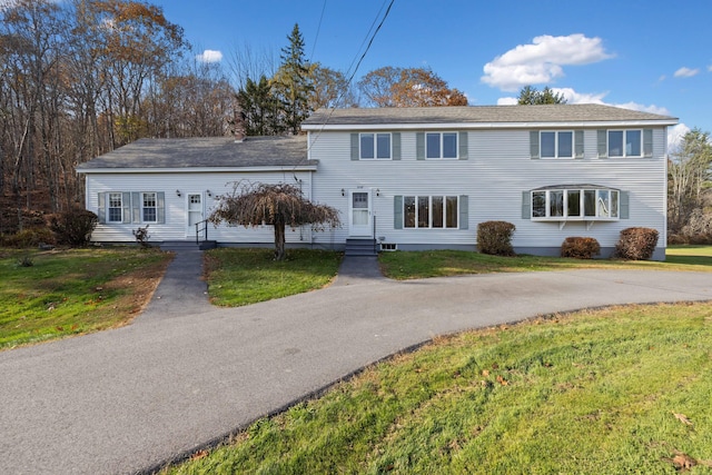 view of front of property with a front lawn