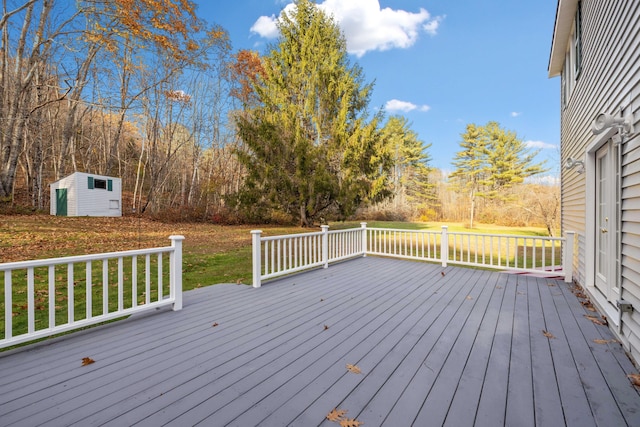 wooden deck with a yard