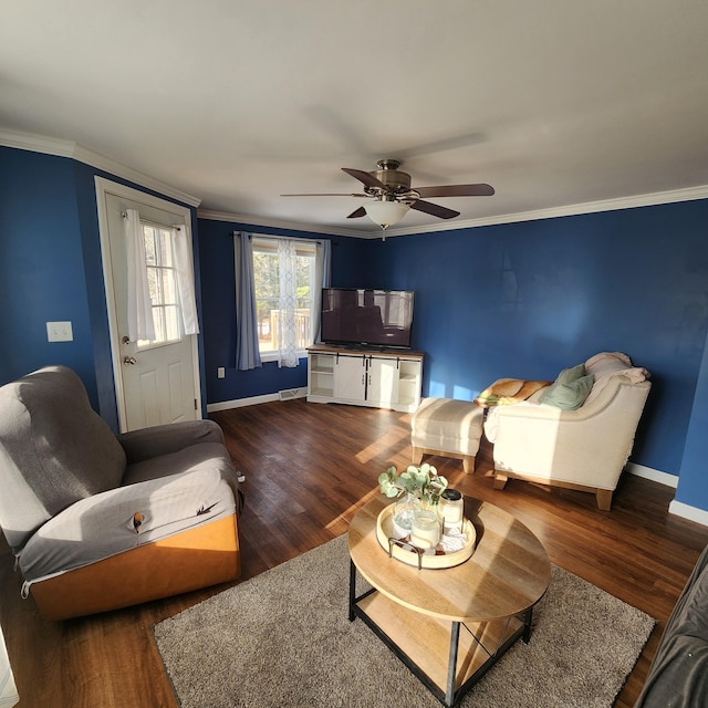 living room with ceiling fan, dark hardwood / wood-style flooring, and ornamental molding