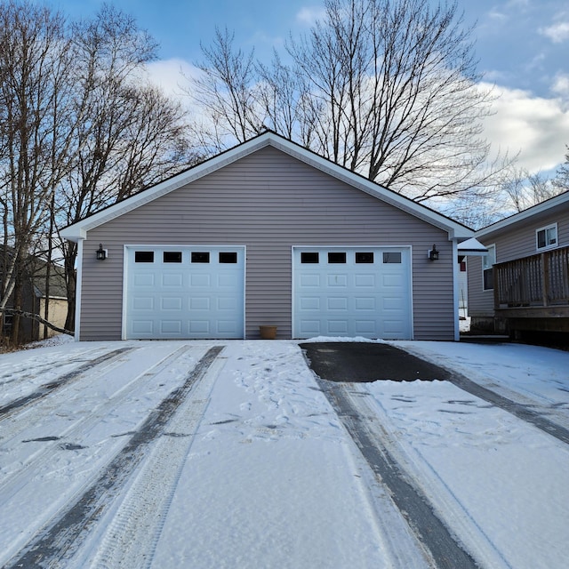 view of snow covered garage