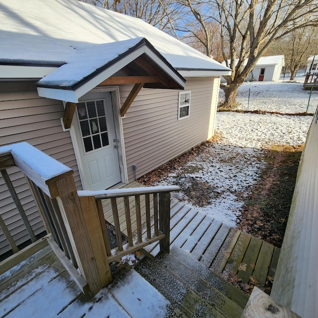 view of snow covered deck