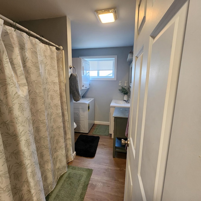 bathroom featuring vanity, toilet, and wood-type flooring