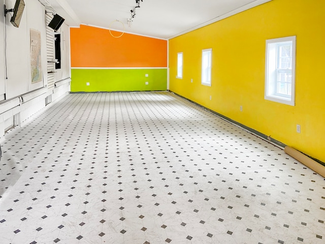 interior space with crown molding