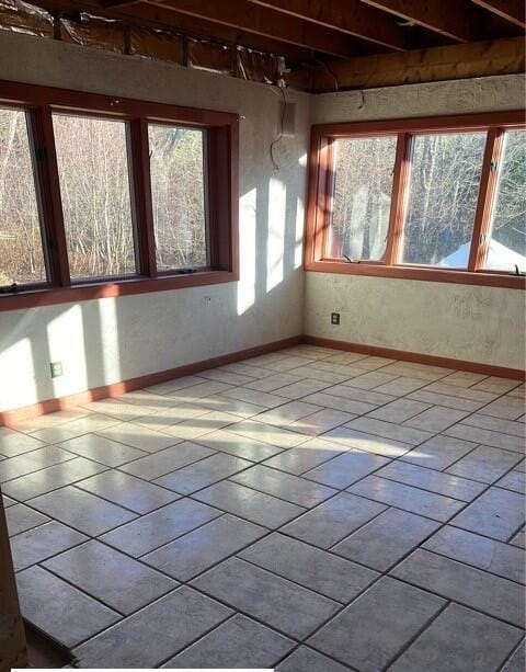 view of unfurnished sunroom