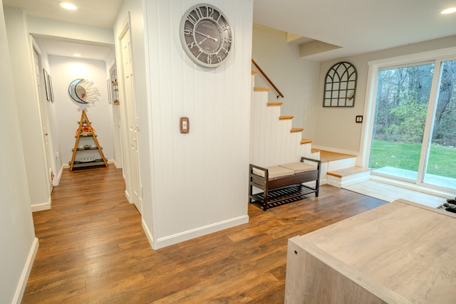 corridor with dark wood-type flooring