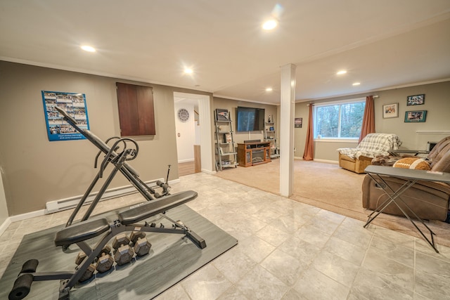 exercise area featuring a baseboard heating unit and crown molding