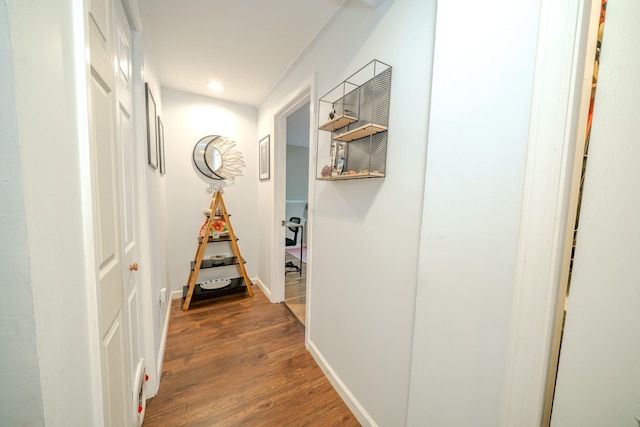 hall with dark hardwood / wood-style floors