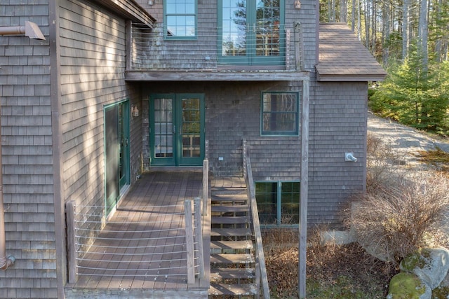 doorway to property with a wooden deck