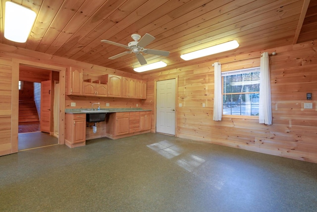 1700 Tremont Rd, Tremont, ME 04674 - kitchen with wooden ceiling, light brown cabinetry, wooden walls, light countertops, and a ceiling fan