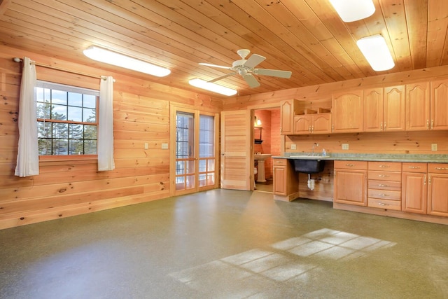 1700 Tremont Rd, Tremont, ME 04674 - kitchen with light brown cabinetry, wood ceiling, wood walls, light countertops, and a ceiling fan