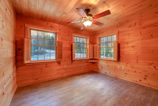1700 Tremont Rd, Tremont, ME 04674 - unfurnished room featuring wooden walls, wood finished floors, a ceiling fan, and wood ceiling