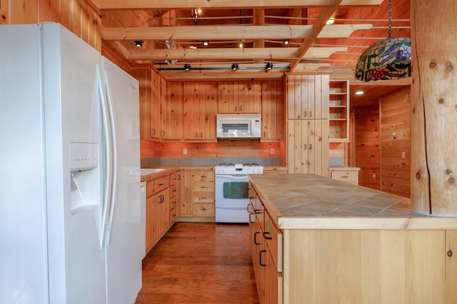 1700 Tremont Rd, Tremont, ME 04674 - kitchen with white appliances, tile countertops, light brown cabinetry, light wood finished floors, and wooden walls