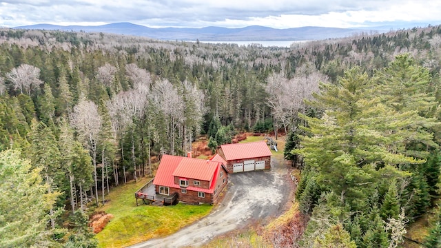 drone / aerial view featuring a mountain view