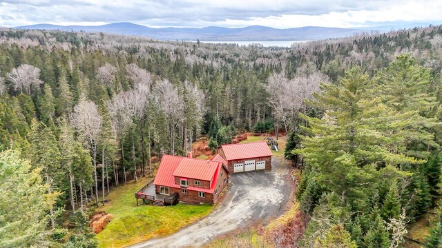 658 Mingo Loop Rd, Rangeley, ME 04970 - aerial view of property and surrounding area featuring a forest and a mountain backdrop