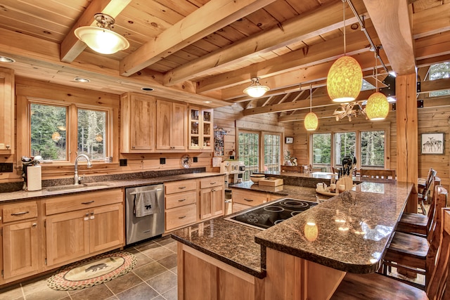 kitchen with wooden ceiling, plenty of natural light, a kitchen island, and stainless steel dishwasher