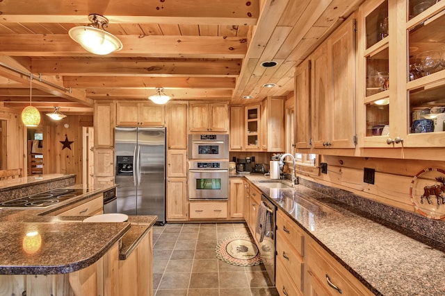 658 Mingo Loop Rd, Rangeley, ME 04970 - kitchen with appliances with stainless steel finishes, light brown cabinets, wooden ceiling with exposed beams, a sink, and dark stone countertops