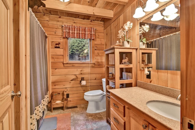 658 Mingo Loop Rd, Rangeley, ME 04970 - bathroom with wood walls, vanity, toilet, a shower with curtain, and wooden ceiling with exposed beams