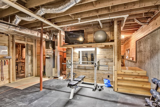 exercise area with wood walls