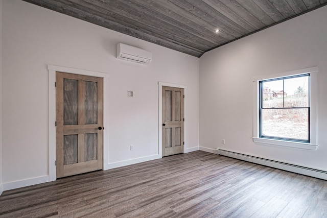 unfurnished room featuring wooden ceiling, hardwood / wood-style flooring, a wall mounted AC, and baseboard heating