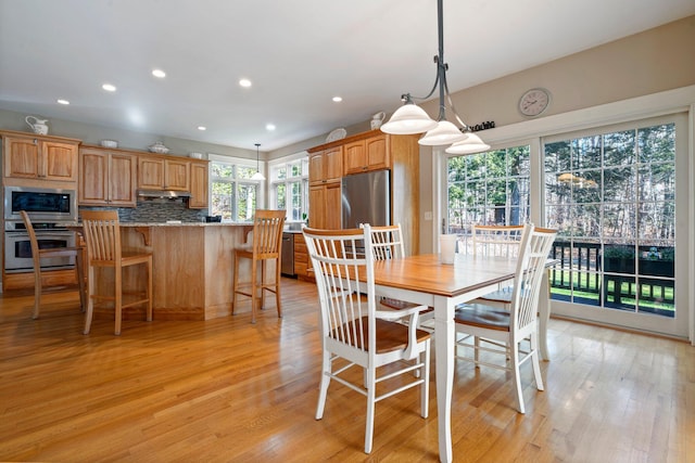 dining room featuring light hardwood / wood-style flooring