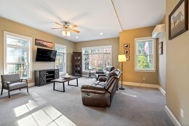 living room with a wall mounted air conditioner, light carpet, and ceiling fan