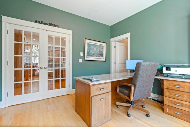 office area featuring french doors and light hardwood / wood-style floors