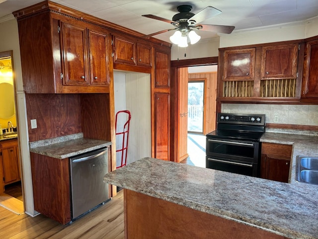 kitchen with stainless steel dishwasher, ceiling fan, ornamental molding, black range with electric cooktop, and light hardwood / wood-style floors